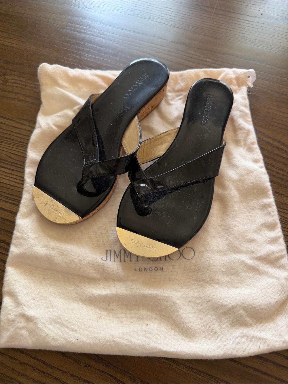 Jimmy Choo Black Patent Leather Wedge Thong Sandals with Gold Toe Caps